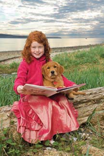 On the cover: Olivia Warman reads to her friend Ginger during a morning at the beach. (Photo by Sean Percy)